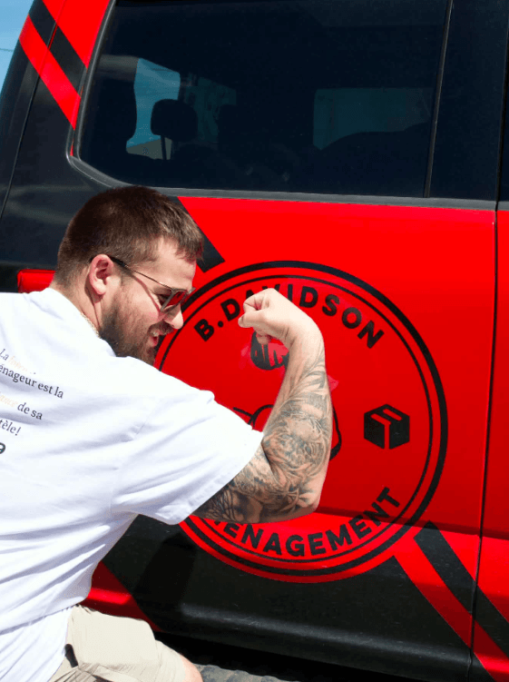 Team member beside a Davidson vehicle