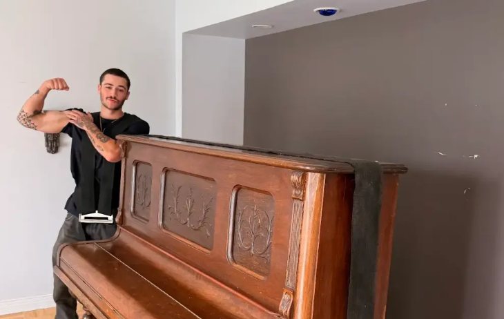 Davidson mover beside an upright piano